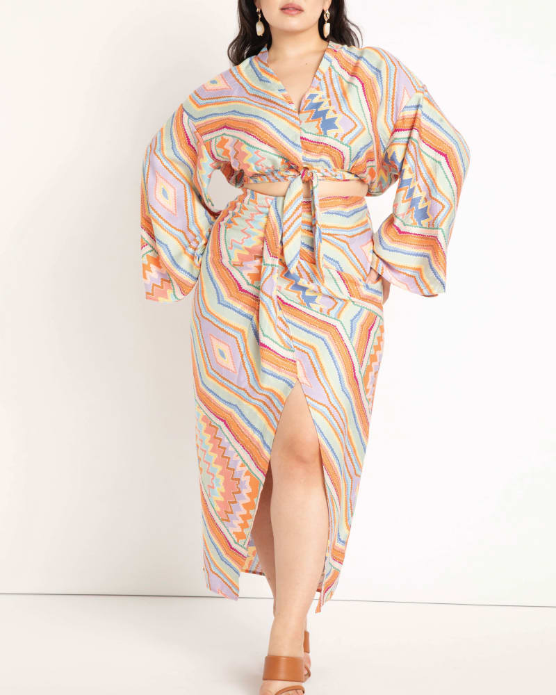 Front of a model wearing a size 14 Gloria Wide Sleeve Blouse in Hidden Gems by ELOQUII. | dia_product_style_image_id:196176